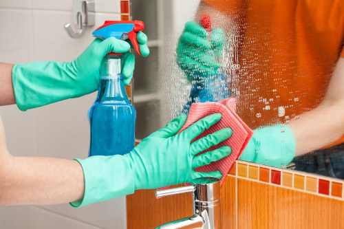 Carpet cleaning technician preparing equipment safely